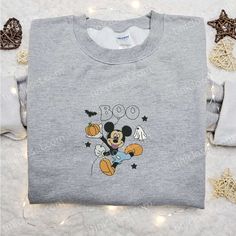 Mickey Boo Embroidered Sweatshirt, Disney Halloween Embroidered Shirt, Best Halloween Gift Ideas Fall Cotton Mickey Mouse Tops, Fall Mickey Mouse Cotton Tops, Cute Mickey Mouse Tops For Fall, Disney Long Sleeve Halloween Sweatshirt, Disney Graphic Print Sweatshirt For Fall, Fall Mickey Mouse Crew Neck T-shirt, Cotton Mickey Mouse T-shirt For Fall, Disney T-shirt With Cartoon Print For Fall, Stitch Sweatshirt