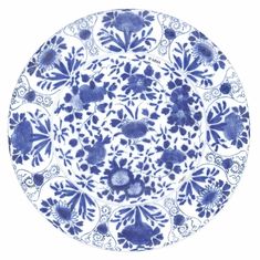 a blue and white plate with flowers on it