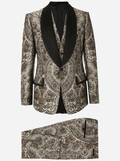 The black and gold-tone silk-cotton blend jacquard-effect three-piece suit from Dolce & Gabbana is power you need to face night. At least until had a few champagne classes. Featuring blazer with peaked lapels, front button fastening, flap pockets, long sleeves, cuffs floral details lapels; waistcoat fastening; trousers belt loops, zip side slit pockets two back buttoned welt pockets; straight leg; regular length.Material: 91% Polyester 9% SilkWaistband: 90% Silk 10% ViscoseMade in ItalyModel Mea Leg Work, Power Suit, Three Piece Suit, Luxurious Design, Dolce E Gabbana, 3 Piece Suits, Tailored Jacket, Three Piece, Polished Look