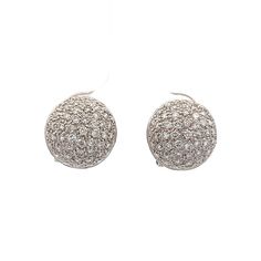 1.10 Ct Domed Pave Diamond Earrings in 18k White Gold These earrings feature a dome shape adorned with round brilliant cut diamonds, with a total weight of 1.10 carats. The diamonds possess VS2 clarity and H color, ensuring a clear and bright appearance. Set in 18 karat white gold, the polished finish enhances the overall sparkle of the diamonds. The pave setting style adds depth and dimension to the design, making these earrings a versatile addition to any jewelry selection. The earrings are secured with stud backs, providing both comfort and security for daily wear. PRIMARY STONE Stone: Natural Diamond Shape: Round Diamond Color: H Clarity: VS2 Weight: 1.10 ct Measurements: 1.25 mm = .01 ct (110) CHARACTERISTICS Measurements: 12.5 mm Era: Modern Composition: 18 Karat White Gold Total Dia Formal White Cluster Earrings With Single Cut Diamonds, White Round Cluster Earrings For Formal Occasions, Formal Round Platinum Cluster Earrings, Diamond White Diamond Earrings With Pave Setting For Formal, Diamond White Round Cluster Earrings For Formal Events, Round Diamond White Diamond Earrings For Formal Occasions, Dazzling Round Pave Set Earrings, Formal Diamond Earrings With Round Accents, Dazzling Round Diamond Earrings For Formal Occasions