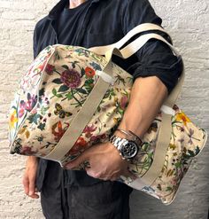 1980s Vintage GUCCI Floral Canvas Foldable Duffle Bag Off-White Designer White Bag With Canvas Lining, White Designer Bag With Canvas Lining, Designer White Bags With Canvas Lining, White Gucci Bag With Handles, Gucci Rectangular Canvas Bag, Luxury White Travel Bag For Daily Use, Gucci Cream Bag For Daily Use, Luxury White Tote Travel Bag, Daily Use Cream Gucci Bag