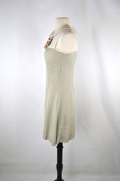 1960s White and Khaki Color Block Sleeveless Dress, A-Line sheath sleeveless dress with a zipper down the back and white and tan/brown polka dot bow underneath the collar. Label: Unknown - No Tag Present Measurements are taken flat; Shoulders: 12 inches Armhole: 7 1/2 inches Neck: 7 inches Bust: 15 inches Waist: 13 1/2 inches Hips: 15 inches Length (shoulder to hem): 34 inches Vintage is anything over 20 years old, I try my best to disclose any flaws that are visible to the eye, such as stains, Fitted Sleeveless Mod Dress, Fitted Sleeveless Sheath Dress In Beige, Fitted Beige Sleeveless Sheath Dress, Beige Fitted Sheath Sleeveless Dress, Fitted Beige Sheath Sleeveless Dress, Fitted Mod Dresses For Daywear, Mod Style Fitted Dresses For Daywear, Sleeveless Mod Dresses For Daywear, Fitted Mod Sleeveless Summer Dress