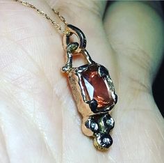 Please go to my Instagram watch the video about this pendant ~ Chic and gorgeous organic bezel set with one piece of Oregon Sunstone full of schilling and three pieces of sparkle diamonds on the bottom. A fun and adorable piece. All handcrafted by me in my Michigan studio. Gem: genuine Oregon Sunstone / fair trade / 1.40ct / imperfection with inclusions genuine diamond / F color / VS grade / three pieces Metal: recycled 14k rose gold / approx. 27mm long, 10mm wide (all components) / chain: 16 in Artisan Rose Gold Sterling Silver Jewelry, Rose Gold Sterling Silver Rectangular Pendant, Rose Gold Sterling Silver Rectangular Pendant Jewelry, Rose Gold Sterling Silver Jewelry With Rectangular Pendant, 14k Rose Gold Pendant Jewelry Gift, Elegant Gemstone Copper Jewelry, Elegant Oval Pendant Copper Jewelry, Elegant Copper Oval Pendant Jewelry, Unique Rose Gold Round Pendant Jewelry