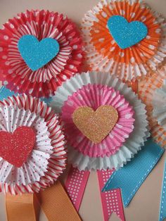 several ribbons with hearts on them are arranged together