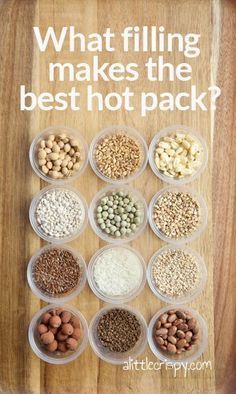 a wooden table topped with bowls filled with different types of beans and nuts next to a sign that says, what filling makes the best hot pack?