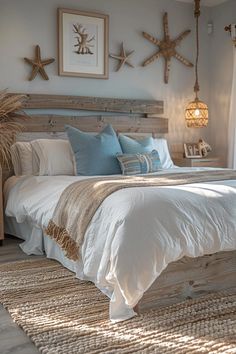 a large bed sitting in a bedroom next to a window with starfish on it