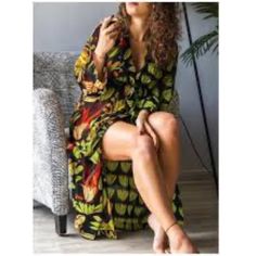 So Gorgeous! 100% Polyester. Flowy V-neck Tropical Dress, Flowy Tropical V-neck Dress, Black Maxi Dress For Day Out, Black Long Maxi Dress For Day Out, Chic V-neck Midi Dress With Tropical Print, Tropical V-neck Party Dress, Long Black Dress For Day Out, Black Long Sleeve Maxi Dress For Summer, V-neck Tropical Print Party Dress