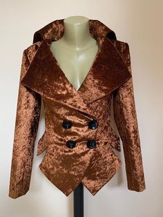 This is a very stylish and elegant jacket . Leght  58cm - at back. Fully lined. A jacket especially made to turn heads and give you that wow factor :)SIZE CHARTSIZE S - US 6, UK 8, EU 36bust: bust around 34.5”/90cmWaist: waist around 27.5”/70cmHips: hips around 34.5”/90cmSIZE M - US 8, UK 10, EU 38bust: bust around 37.5”/95cmWaist: waist around 29.5”/75cmHips: hips around 37.5”/95cmSIZE L - US 10, UK 12, EU 40bust: bust around 39.5"/100cmWaist: waist around 31.5”/80cmHips: hips around 39.5”/100c Gold Velvet Tuxedo Jacket, Gold Winter Blazer With Buttons, Gold Blazer With Buttons For Winter, Party Outerwear With Double Button Closure And Lapel Collar, Gold Single-breasted Winter Blazer, Winter Gold Single Breasted Blazer, Gold Single Breasted Blazer For Winter, Gold Single-breasted Blazer For Winter, Gold Blazer With Double Button Closure For Fall