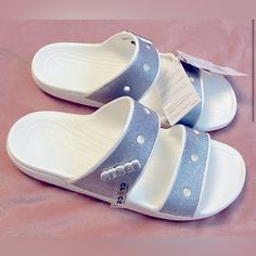 New With Tags White Glitter Open Toe Sandals, Casual Flat Glitter Sandals, Casual Glitter Sandals For Spring, Casual Glitter Sandals With Synthetic Material, Casual Glitter Synthetic Sandals, Casual Glitter Sandals, Casual Silver Slides With Round Toe, Casual Open Toe Glitter Sandals, Crocs Shoes Women