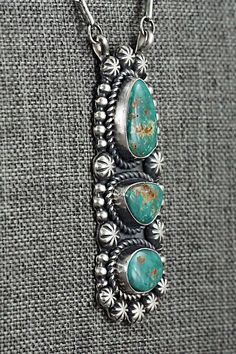 This stunning natural Sonoran turquoise and sterling silver necklace was made by Navajo silversmith Jeff James. The back is signed JJJ and stamped sterling.Necklace: 20" with additional 2" extender chainPendant Length: 2 1/2"Pendant Width: 1"Free shipping on all orders! We ship with USPS and always include tracking. All orders ship within a day of payment.Returns are accepted up to 30 days after you receive your order. Just send us a message. Our shop offers cash back or store credit. The item m Santa Fe Jewelry, American Lifestyle, Sterling Necklace, Native American Turquoise, American Turquoise, Cowgirl Western, Western Jewelry, Cowgirl Style, Silver Pendants