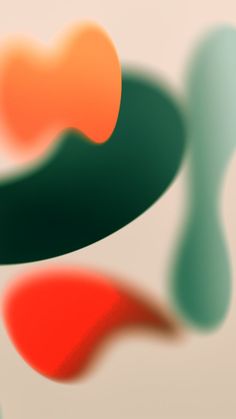 an abstract image of two different colors on a white background, one is orange and the other is green