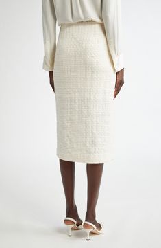 The label's devotion to timelessly elegant essentials shines in this wrap-inspired tweed skirt lightly kissed with linen and traced with fraying edges. Hidden side-zip closure Front slit Lined 44% cotton, 28% linen, 28% polyamide Dry clean Imported Designer Clothing Elegant Essentials, Tweed Pencil Skirt, Tweed Skirt, Fabric Gift Bags, Nordstrom Store, Fabric Gifts, Free Fabric, Anniversary Sale, Print Gifts