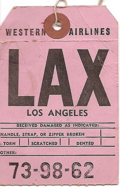 a pink luggage tag with the word lax on it's front and back side