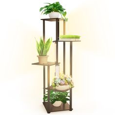 three tiered plant stand with potted plants on each shelf and one green plant in the middle