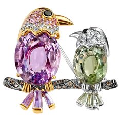 2 Birds on a Branch in 18kt Gold With 13.89ct. Semi Precious Stones, Diamonds, Pink Sapphire Brooch Amethyst and tourmaline together 13.89 ct. Diamonds: White brilliant cut diamonds together 0.48 ct. Black diamonds together 0.10 ct. Cognac diamonds together 0.21 ct. sapphire: Pink sapphire in total approx. 0.4 ct. Material: 18kt Pink, White, Black gold Measurements: 32 mm x 29 mm x 10.6 mm Total weight: 10.7 gram / 0.380 oz / 6.9 dwt Sapphire Brooch, Birds On A Branch, Cognac Diamonds, Bird On Branch, Jewelry Boards, Semi Precious Stones, Brilliant Cut Diamond, Pink Sapphire, Black Diamond