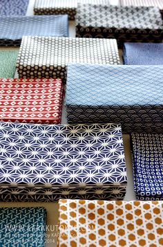 many different colored ties laid out on top of each other