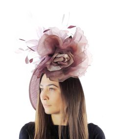 Hats By Cressida Kentucky Derby & Ascot Fascinator Hats Burgundy Lilac Ariel Sinamay Feather & Silk Fascinator Gorgeous trimmed feathers surround large silk rose  with a large saucer sinamay base Base measures about 12 inches wide Mounted with a matching headband. If you prefer a headband to match your hair, please make a note at check out what colour headband you want. Get ready to steal the show with the stunning Ariel Fascinator Hat! Perfect for any special occasion, this headpiece is the epi Brown Wedding Hats For Kentucky Derby, Brown Hats For Kentucky Derby Wedding, Brown Kentucky Derby Wedding Hat, Brown Party Fascinator Hat, Elegant Brown Top Hat For Kentucky Derby, Elegant Brown Mini Hats For Party, Elegant Fitted Brown Fascinator, Headpieces For Kentucky Derby Ceremonies, Fitted Brown Costume Hats And Headpieces For Party