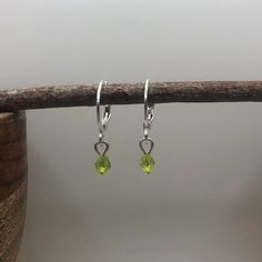 Lime green acrylic bicone bead earrings with silver plated sleeper style hoop. Super light weight feel Green Hoop Earrings As A Gift, Green Teardrop Hoop Earrings For Jewelry Making, Green Teardrop Nickel Free Hoop Earrings, Hypoallergenic Green Hoop Earrings For May Birthstone, Green Hypoallergenic Hoop Earrings For May Birthstone, Green Dangle Hoop Earrings With Tiny Beads, Green Sterling Silver Hoop Earrings For May Birthstone, Handmade Small Green Hoop Earrings, Green Dangle Hoop Earrings For May Birthstone