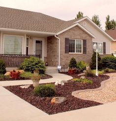 a house with landscaping in front of it