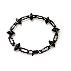 Handcrafted mens bracelet with a heavy pewter antiqued black spikes chain. Super cool and fashion forward, wear it with Jeans and a T-shirt or dressed up. Bracelet measures 7.5" Available in any custom size Made with love in Los Angeles Complimentary gift wrapping provided All sales final. Black Punk Chain Bracelet As A Gift, Black Punk Style Chain Bracelet As Gift, Black Punk Style Chain Bracelet For Gift, Punk Style Black Chain Bracelet Gift, Black Gothic Jewelry With Spikes, Gothic Metal Bracelets With Spikes, Black Metal Spiked Jewelry, Black Metal Jewelry With Spikes, Black Punk Jewelry With Spikes