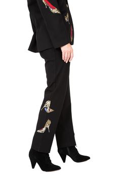 #P21460C- Stepping in Stilettos Pant- Both casual and dressy ponte stretch knit pant with button front, lined side pockets.Great conversational item to suit up with #P21544C- Stepping in Stilettos Blazer. Bottom of pant has two leopard appliquéd high heels, adorned with crystal rhinestones in a black and colbolt blue color. The inside of the waistband is lined with the same leopard print as the heels.Day to nite dressing has been made easy!!ImportedSize S-XXL Fall Tapered Leg Elastane Dress Pants, Fall Elastane Tapered Leg Dress Pants, Tailored Chic Elastane Pants, Spring Formal Elastane Pants, Chic Tailored Elastane Pants, Spring Tailored Elastane Pants, Spring Office Elastane Pants, Chic Ankle-length Elastane Dress Pants, Stretch Pants For Office Wear In Fall