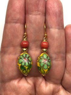 Vintage Floral Cloisonné Bead from the 80s (over 30 years old) Earrings with Red Sea Bamboo Beads. Very elegant and one of a kind! Cloisonné is the technique of creating designs on metal vessels with coloured enamel placed within enclosures made of copper or bronze wires. The beads have a beautiful floral pattern with yellow, green, red, blue and white enamel. Paired with red sea bamboo beads, these are very colourful earrings!  - Made with Cloisonné Beads from the 80s (over 30 years old), Red S Old Earrings, Bamboo Beads, Colourful Earrings, Cloisonne Jewelry, Cloisonne Earrings, Bamboo Earrings, Colorful Earrings, Red Sea, Enamel Earrings