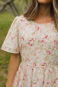 Get ready to charm in the Brooks Dress-Ivory Rose! Featuring a keyhole button closure, round neckline, and eyelet over a floral pattern, this dress is perfect for any occasion. With short sleeves and a scalloped hem on the skirt, you'll be both stylish and comfortable. Say yes to this playful and unique dress! *Fitted bust; flowy* Material Content: 100% Polyester // Lining: 100% Polyester Material Pattern: Eyelet // Floral Bryn is 5’1” and wearing a small Model Measurements: Bryn: Height: 5’1” / Sunday Dresses, Dusty Rose Dress, Unique Dress, Dress Fitted, Dress Dusty, Dreamy Dress, Church Outfits, Say Yes, Scalloped Hem