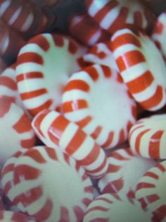 some red and white candy canes in a bowl