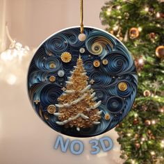 a christmas ornament hanging from a tree