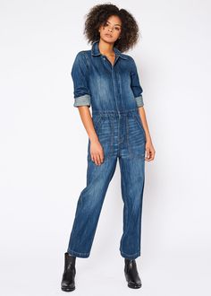 This denim jumpsuit offers a stylish look with reliable comfort. Constructed from 100% cotton, it provides a secure fit while remaining breathable.Model is 5'10" wearing size small. Approx. Body Length: 54 1/2”, Sleeve Length: 23 1/2” Approx. Knee: 19”, Leg Opening: 16 1/2” 100% Cotton Made in USA Fits true to size. Long Sleeve Denim Jumpsuit, Workwear Style, Perfect Denim, Clothing Outfits, Jumpsuit Jacket, Workwear Fashion, Denim Style, Denim Jumpsuit, Colored Denim