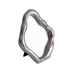 a metal object is shown on a white background