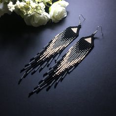 "These black gold beaded earrings pair amazingly with any outfit, dressy or casual. They are made of high-quality Czech colored beads with steel . Colors: black beige gray silver Length: 6.3 inches (16 cm) Width: 1 inches (2,5 cm) Materials: Czech \"Preciosa\" beads Durable synthetic thread medical steel" Gold Beaded Earrings, Outfit Elegant, Gold Bead Earrings, Beaded Fringe Earrings, Beaded Earrings Tutorials, Luxury Earrings, Earring Tutorial, Holiday Earring, Beaded Dangle Earrings