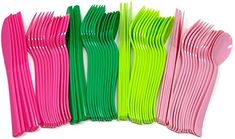 many different colors of plastic forks lined up in a row on a white background with one fork sticking out from the top