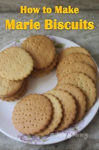 a white plate topped with cookies on top of a table