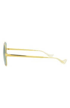 Sophisticated angles shape a pair of handcrafted Italian-made sunglasses designed to be bring eye-catching elegance to your street style. 60mm lens width; 18mm bridge width; 145mm temple length 100% UV protection Metal frame material Nylon lens material Made in Japan Square Frame Glass Aviator Sunglasses With Mirrored Lenses, Gucci Gold Sunglasses For Summer, Modern Gucci Cat Eye Sunglasses With Uv Protection, Modern Gucci Cat Eye Sunglasses With Square Frame, Modern Gucci Cat Eye Square Frame Sunglasses, Modern Gucci Square Frame Cat Eye Sunglasses, Gucci Modern Square Frame Cat Eye Sunglasses, Gucci Square Frame Metal Sunglasses, Gucci Green Sunglasses With Mirrored Lenses