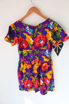 "about 34\"bust 30\"long xsmall/ small womens vintage 1960s-70s dreamy print dress good condition 1970s RARE easy care and wear retro print wear dressy or casual zippers in the back RARE appears to be vintage handmade Thank YOU and please feel free to ask me any ?s:) Have a lovely day!! xoxo www.etsy.com/shop/retroandme" Retro Purple Dress For Spring, Groovy Fitted Floral Print Dresses, Retro Mini Length Purple Dress, Retro Purple Spring Dress, Purple Retro Spring Dress, Retro Purple Mini Dress, Vintage Purple Mini Dress, Mod Style Multicolor Floral Print Dress, Fitted 1970s Style Purple Dress