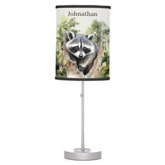 a lamp with a raccoon on it