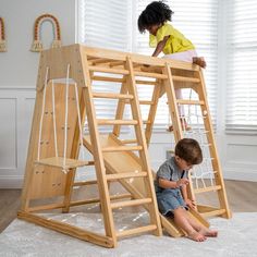 two children playing on a wooden ladder in a play room with white carpet and windows