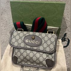 Brand New, Never Used Gucci Neo Vintage Small Messenger Bag. W/ Receipt. Box And Dust Bag Included. Beige/Ebony Gg Supreme Canvas, With Brown Leather Trim Brass Hardware Oval Gucci Leather Tag With Metal Feline Head Green And Red Web Strap Flap Pocket On The Front And Back Interior Open Pocket Adjustable Shoulder Strap With 20" Drop Small Size: W8.5" X H6.5" X D1.6" Made In Italy Designer Rectangular Bag With Logo Plaque, Formal Gucci Bags With Logo Plaque, Designer Brown Bag With Logo, Designer Brown Bags With Designer Logo, Luxury Bags With Logo Plaque, Luxury Logo Bags As Gifts, Designer Gucci Bag With Logo, Gucci Brown Bag Perfect For Gift, Brown Gucci Bag As Gift