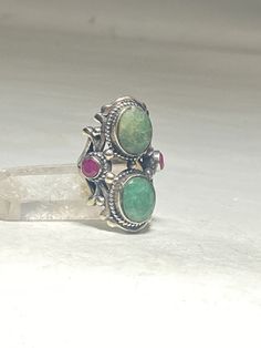 "Emerald Ring Ruby long sterling silver women Low grade stones Size 6.50 Weight 14.8g Length 1 1/2\" Width. 1/2\" Thinnest part of band. 1/8\" Free Shipping & Free Postal Insurance Delivered in a Gift Box If you do not want the ring polished and want to leave the natural patina please let me know at the time of purchase as I do polish rings before I ship rings out. Thanks Free First Class shipping and postal insurance is included. If you want to upgrade to priority kindly pay an additional f Silver Oval Emerald Ring With Multi-stone, Silver Emerald Ring With Three Stones, Oval Shape, Oval Silver Emerald Ring With Multi-stone, Oval Emerald Ring In Silver With Multi-stone, Silver Three Stone Jewelry, Silver Emerald Ring With Stones, Sterling Silver Multi-stone Emerald Ring, Silver Multi-stone Ruby Ring In Sterling Silver, Silver Emerald Ring With Stones In Fine Jewelry Style