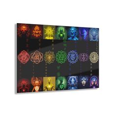 the seven chakras in different colors on a black background canvas wall art print