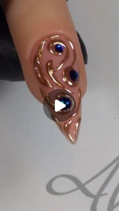 Alina Hoyo Nail Artist on Instagram: "💙 Step by Step 💙  1. Apply the Matte Top Coat. 2. Smooth the surface with a fine buffer. 3. Paint the design using Emboss It. 4. Apply Chrome 07 over the design. 5. Seal with No Wipe Top Coat. 6. Add the stones, and you're done!  💙 💙 💙  #BlueNails #GoldNails #LuxuryNails #NailInspo #StilettoNails #CrystalNails #ElegantNails #NailDesigns #NailsOfInstagram #NailTrends2024 #GoldDetails #ArtisticNails #HandPaintedNails #NailAddict #RoyalBlueNails" Nail Videos, Royal Blue Nails, Instant Nails, Crystal Nails, Elegant Nails, Luxury Nails, Gold Nails, Stiletto Nails, Blue Nails