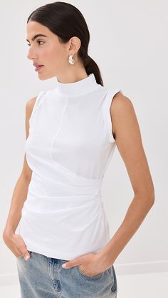 3.1 Phillip Lim Draped Mock Neck Tank | Shopbop White Fitted High Neck Tank Top, Fitted Funnel Neck Cotton Tops, Fitted Cotton Funnel Neck Top, Fitted Cotton Top With Funnel Neck, White Fitted Funnel Neck Top, White Sleeveless Elastane Tank Top, White High Neck Stretch Tank Top, White Sleeveless Ruched Top, White Ruched Sleeveless Top