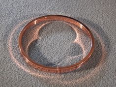 I am offering you this fabulous vintage copper bangle style bracelet. It features a sensational sleek classic design and it is oh so chic! Bracelets like this are such a popular fashion trend this season. They are great for pairing with other bangle bracelets, or are great for wearing alone. This is a must have accessory for the vintage jewelry collector. The bracelet measures an impressive approx. 2 5/8 inches in diameter, in the opening that your wrist fits through. And, it measures approx. 3/ Elegant Rose Gold Copper Bangle, Vintage Sterling Silver Rings, Popular Fashion, Bangles Style, Wide Band Rings, Stackable Bracelets, Genuine Turquoise, Vintage Copper, Amethyst Stone