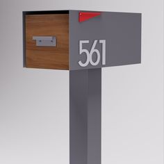 a mailbox with the number 661 on it's front and side panels