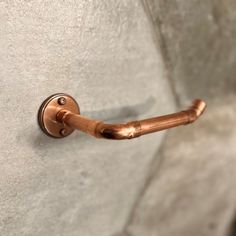 a close up of a metal handle on a wall