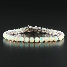 Designer Chromia Bracelet, Stamped With The Designer Hallmarks: Chromia 18k India C-14.18 Absolute Luxury And Quality New With Tags, Retail Price On Tags $9500 14.18 Tcw Of High-Quality Natural Opal, Round Cabochon 18k White Gold, Stamped 18k Heavy And Well Made, 15.2 Grams 6.5" In Size Weight: 15.6 Grams, Heavy And Well Made Luxury White Oval Diamond Bracelet, Luxury White Tennis Bracelet For Wedding, Luxury White Tennis Bracelet, Luxury White Jubilee Tennis Bracelet, White Tennis Bracelet For Formal Occasions, Exquisite White Bracelet For Formal Occasions, White Gemstone Tennis Bracelet, Exquisite White Tennis Bracelet For Formal Occasions, Elegant White Tennis Bracelet For Formal Occasions