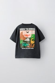 DINOSAUR T-SHIRT - Black | ZARA United States Zara Cartoon Print Crew Neck T-shirt, Black Dinosaur Print Short Sleeve T-shirt, Black Short Sleeve T-shirt With Dinosaur Print, Zara Crew Neck T-shirt With Character Print, Staple Dress, Trench Coat Dress, Zara Australia, Shirt Blouses Tops, Cardigan Sweater Jacket