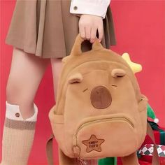 Carry a dash of capybara charm with our Small Capybara Plush Backpack – a delightful and functional accessory that brings a touch of whimsy to your daily adventures. This kawaii backpack isn't just for essentials; it's a celebration of the adorable capybara spirit and the joy they bring into your life. Transform your outings with the delightful charm of our Small Capybara Plush Backpack – where cuteness meets convenience in every carry. Size: 24x11x29CM Capybara Plush, Kawaii Backpack, Plush Backpack, Functional Accessories, Your Back, Carry On, Backpacks, Bring It On, Kawaii