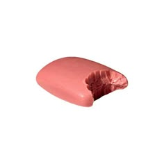 a piece of pink colored food on a white background with clippings to the side